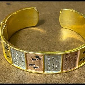 Footprints Gold tone cuff Bracelet.   Beautiful!